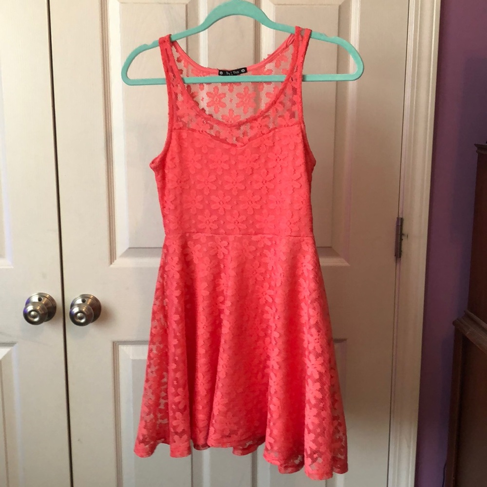 This is a short, peach floral dress